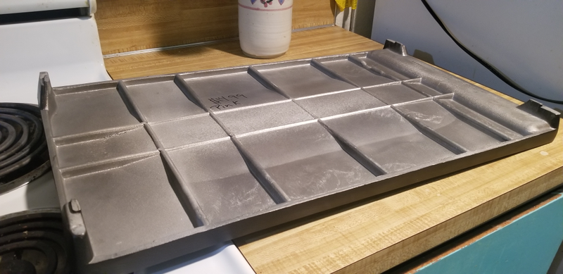 I know cast iron cookware is normally blackened at some stage of the manufacturing process. Is this what unblackened cast-iron looks like?
